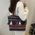 Ethnic colorful woven shoulder tote bag with cute tassels and geometric patterns for daily use - Red