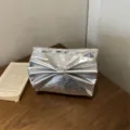Silver metallic bow clutch bag for women, stylish large capacity evening handbag. - Silver