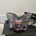 Woven tote bag for women, ethnic geometric wide strap shoulder bag with cute colorful tassels. - Blue