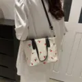 Summer straw woven tote bag with cute cherry embroidery, spacious shoulder bag for women. - Black