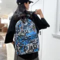 Large capacity casual backpack with cool graffiti and dinosaur print for daily use and school - Blue
