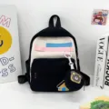 Cute cartoon kids backpack with bear pendant, stylish lightweight school bag for students. - Black