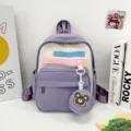Cute purple backpack with bear pendant, stylish casual school bag for kids and students. - Purple