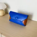 Chic color-blocked clutch bag for women, elegant envelope design for evening parties and events. - Blue