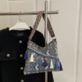 Ethnic style vintage shoulder crossbody bag with colorful woven pattern and chic tassels. - Blue