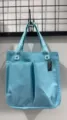Hellblaue Segeltuchtasche mit mehreren Fächern, Freizeittasche für Arbeit und Alltag. - Seeblau
