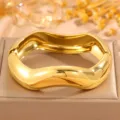 Gold wide wavy stainless steel open bangle bracelet, fashionable irregular stacked cuff style. - Gold Wave Polished Bangle (Style 5)