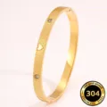 18K vergoldetes Titanstahl Armband mit Streifenmuster, Kristallen und Herz Design. - Gestreifter Herz Strass Stil / Gold