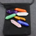 Detail shot of colorful double terminated crystal pillars set on black pouch, crystal decor. - Colorful Hexagonal Pillars With Velvet Bag / 7-Piece Set