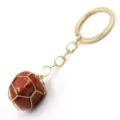 Detail shot of natural stone wire-wrapped keychain with gold metal ring and chain. - 3-Section Chain / Red Jasper