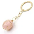 Detailed view of natural rose quartz wire-wrapped keychain with gold metal ring pendant. - 3-Section Chain / Rose Quartz