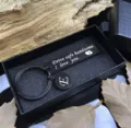 Black engraved stainless steel keychain with letter E charm set in a classic gift box. - Black Gift Box
