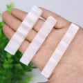 Natural raw white selenite crystal sticks close-up, crystal healing wand detail view representation - 6-9CM