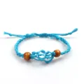 Handwoven blue cord bracelet with brown wooden beads and adjustable net pocket for stones - Bracelet / Net bag size 3-5CM / Blue