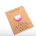 Detail shot of a gradient pink heart crystal stone attached to a greeting card for gift. - 1 Piece / Pink