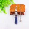 Close-up detail of the hexagonal blue crystal pendulum pendant necklace with intricate silver cap. - Lapis Lazuli Bead Chains