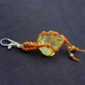 Natural raw crystal stone keychain with orange woven net, vintage metal clasp pendant. - Citrine