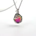 Close-up detail of vintage leaf vine wrapped colorful stone necklace pendant, exquisite craftsmanship. - Purple Rainbow