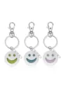 Porte-clés en métal argenté avec pendentifs émaillés sourire coloré. Joli accessoire. - Bleu et bleu-vert lumineux / Vert-Sourire Joyeux