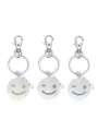 Kit de porte-clés en métal avec pendentifs smiley clignant en vert, violet et bleu vif. - Bleu et bleu-vert lumineux / Bleu-Visage Plissant les Yeux (NY1271)