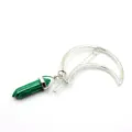 Detail view of silver crescent moon hair clip featuring a green hexagonal crystal stone. - Malachite