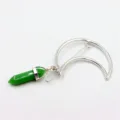 Close-up detail of green crystal hexagonal pillar pendant on silver crescent moon hair clip. - Green Aventurine