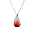 Detailed view of the cute owl pendant necklace featuring a vibrant red stone body texture. - Red Turquoise Look