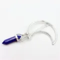 Detail shot of the blue crystal hexagonal pillar pendant and silver moon hair clip accessory. - Lapis Lazuli