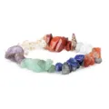 Detailed view of a natural stone chip crystal bracelet with colorful irregular chakra beads. - Rainbow