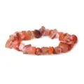 Natural carnelian chip gemstone bracelet detail shot, irregular crystal quartz stretch jewelry piece. - Red Agate