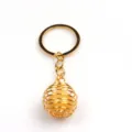 Goldfarbener Drahtfeder-Kugelschlüsselanhänger mit gelbem Kristallperle für Damen Geschenk. - Topas