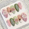 Almond press-on nails set featuring 3D floral art, rhinestones, and silver swirls stylish. - 30 Pieces/Box / Pink Green Silver Foil (2XB1-14910)