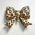 Leopard print bow foil balloon for birthday party decoration, animal theme event supplies. - Leopard Bow / 21 Inches