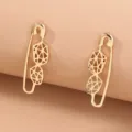 Gold geometric safety pin earrings detail view, unique hollow mesh design fashion accessory. - NE782 - Metal Alloy Asymmetric Grid Safety Pin Earrings