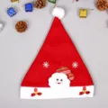Plush Santa hat with cute cartoon Santa face and snowflake decor for Christmas party props. - Santa Christmas Hat (Kids)