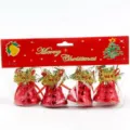 Close-up detail of 4.5cm red electroplated Christmas bells with bows and pine needle decor. - Diamond Pattern Bell / 4 Pieces/Pack / Red