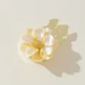 Floral button cover detail, pearl white and yellow petals with gold metal clip base. - Yellow