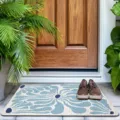 Vista detallada del felpudo de entrada nórdico con patrón floral azul en la puerta. - 40*60cm / HR nórdico-4
