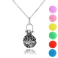 Vintage hollow silver aromatherapy ball pendant necklace with colorful pom pom refills. - Hollow Ball Style (NX033)