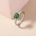 Square green stone pave cubic zirconia ring detail showcasing the elegant silver band design. - Size 7 / Cushion Green Style (SE1163) / Silver