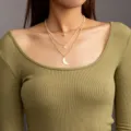 Meerdere lagen gouden ketting met ster en maan hangers en parel details voor vrouwen. - Goud Glimlach Ster Maan Stijl