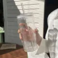 Clear ribbed glass cup with straw and lid, stylish drinkware for daily home and coffee use. - 650ml / Glacier Striped Straw Cup