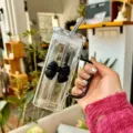 Transparent square glass cup with black bow handle and straw, aesthetic coffee milk mug. - Black