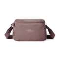 Sac à bandoulière en nylon pour femme, sacoche décontractée multi-compartiments pour les voyages. - Rose