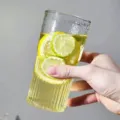 Clear ribbed glass cup with vertical stripes, elegant drinkware for water, coffee, or iced tea. - 650ml / Glacier Striped Straw Cup