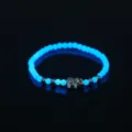 Leuchtendes Perlenarmband mit dunklem Elefanten-Anhänger, blaues Modeaccessoire. - Elefant Stil (NY832)