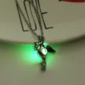 Fashion silver hollow bird pendant necklace with glowing green luminous bead for women - Dove-Yellow Green Glow