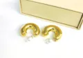 Chunky gold C-shaped hoop earrings with elegant pearl accents for trendy daily fashion wear. - C-Shaped Pearl Style / 10x30mm / Gold