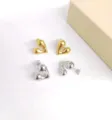 Chic 18K gold plated stainless steel asymmetric twisted heart earrings, stylish variant design. - Polished Heart Gold