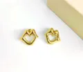 Chic gold lips shaped earrings, minimalist metal jewelry for modern stylish wear. - Lip (Gold) / Gold